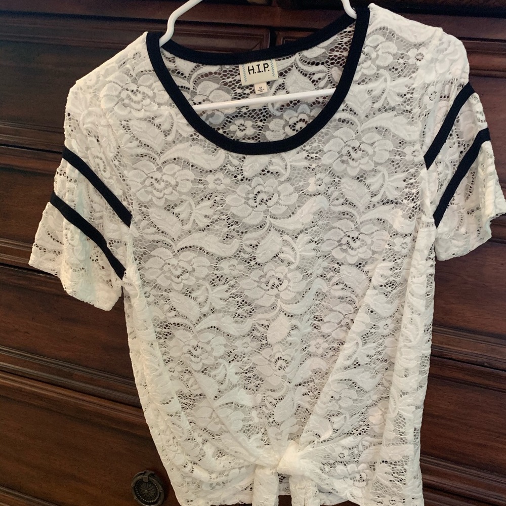 H.I.P. White lace with black trim tie front top.